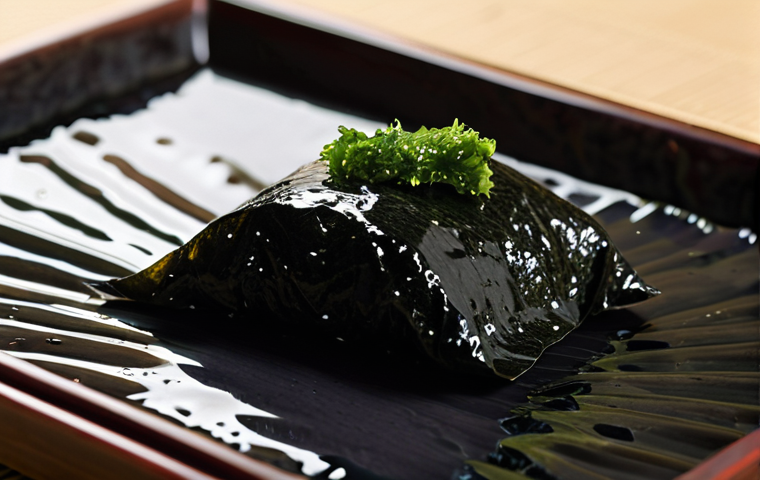 **

Close-up of high-quality, glossy black Nori seaweed sheets. The texture should appear slightly crisp and the color deep. In the background, subtly hint at a traditional Japanese sushi-making scene.
**