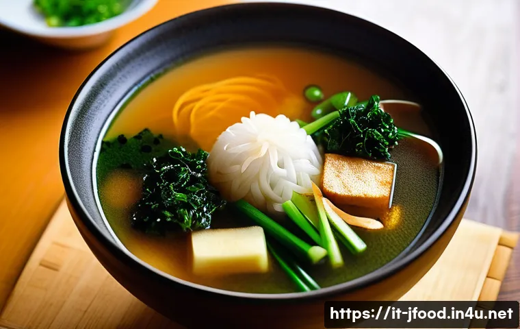 일본 전통 식재료 - **Prompt: The Essence of Umami - A Steaming Miso Soup in Kyoto**
    A close-up, high-angle shot of ...
