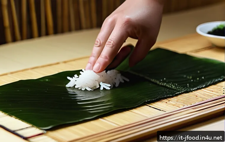 일본 요리 레시피 모음 - A close-up of a traditional Japanese sushi preparation scene, featuring a skilled hand delicately sp...